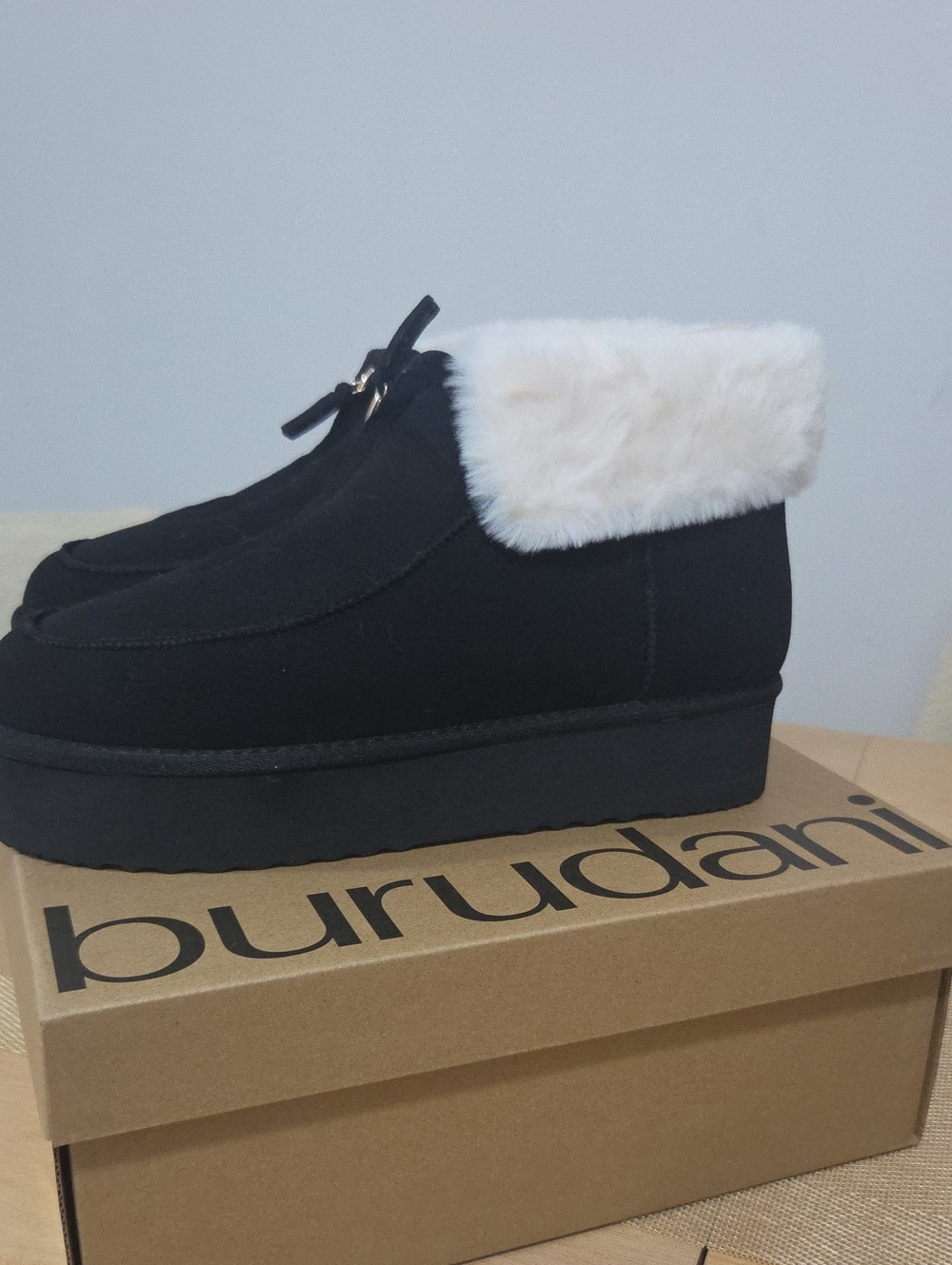 Burudani Women's Black Platform Moccasin with Cream Fur Trim